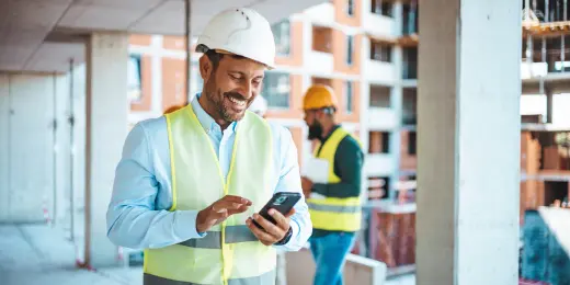 A worker allowed entry using digital construction site access control