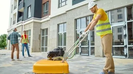 a professional conducting post-construction cleaning in accordance with the guidelines stated in a post-construction cleaning checklist|Post Construction Cleaning Checklist Sample Report|Post Construction Cleaning Checklist