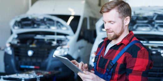 a fleet maintenance supervisor checking company vehicles