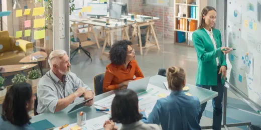 A meeting being guided by a change impact assessment template