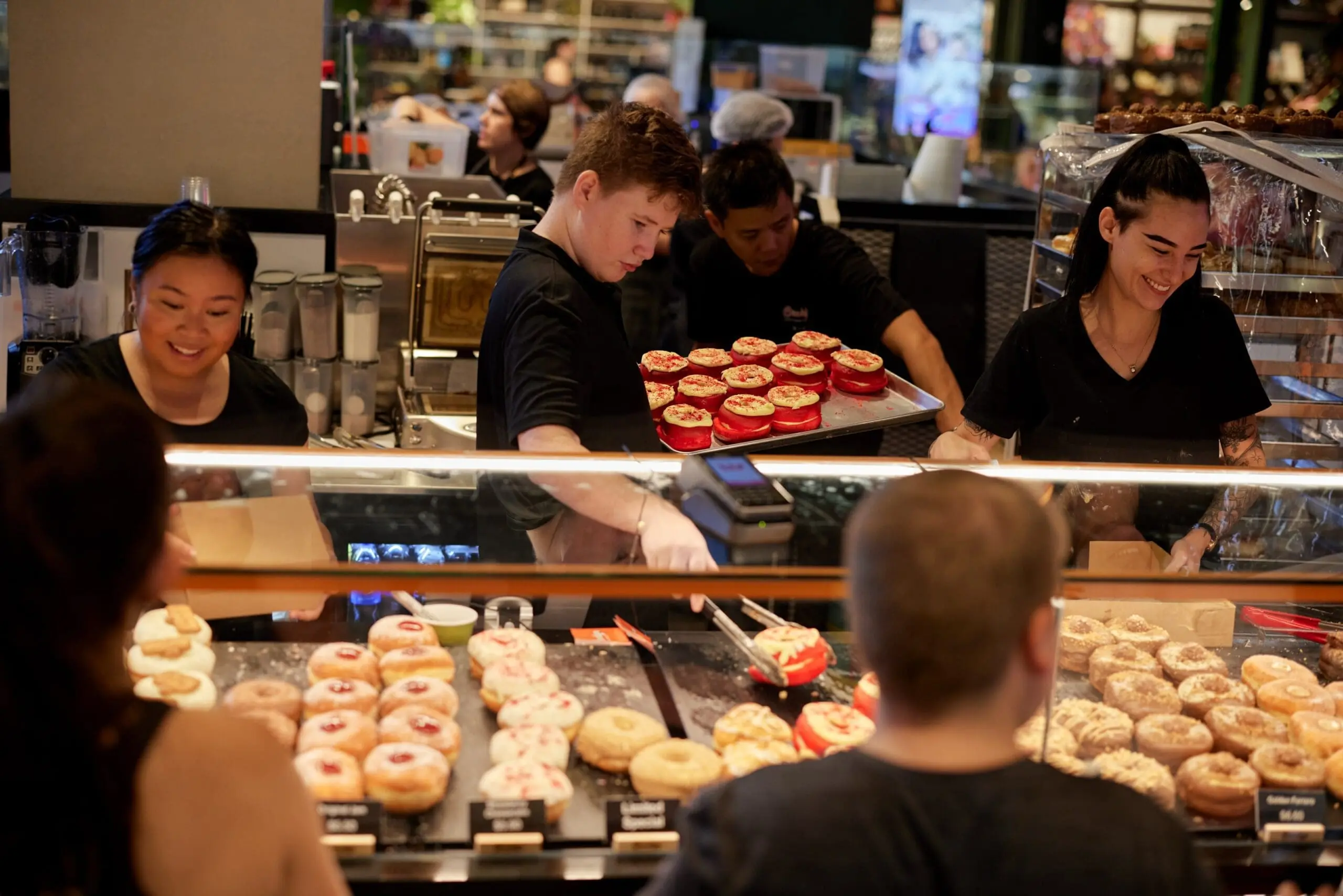 Brooklyn Donut staff serving donuts and coffee